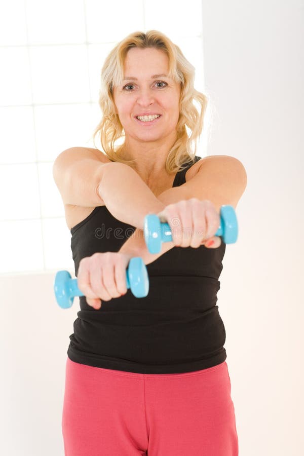 Woman with dumbbell