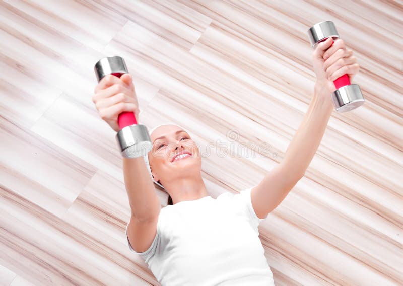 Woman with dumbbells