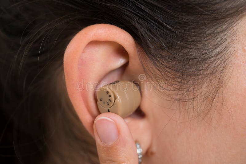 Woman Ear With Hearing Aid
