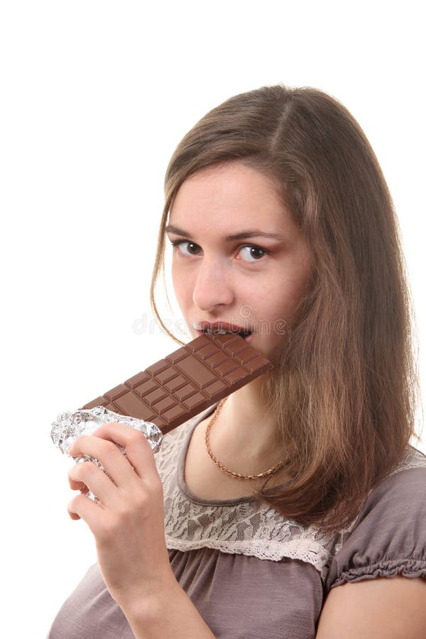 Woman eat chocolate