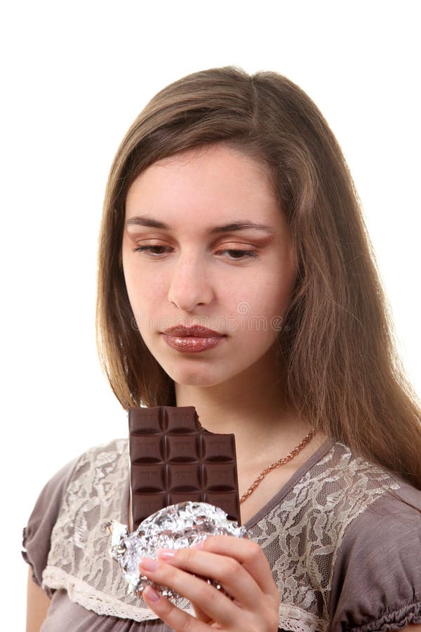 Woman eat chocolate