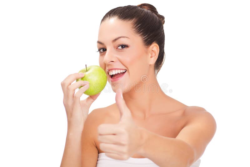 Woman eat green apple