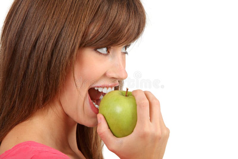 Woman eating an apple.