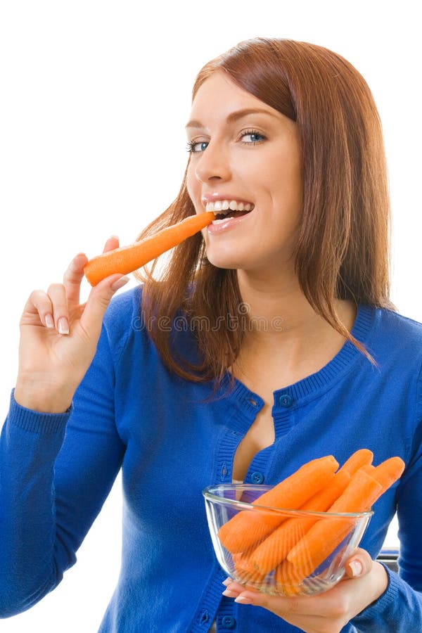Woman eating carrots, isolated