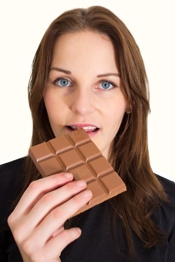 Woman Eating Chocolate stock images Woman Eating Chocolate stock images