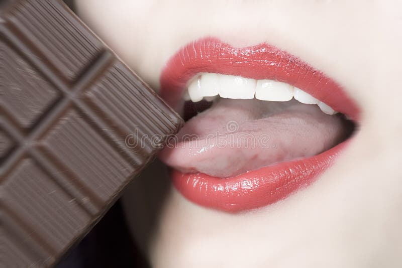 Woman eating chocolate