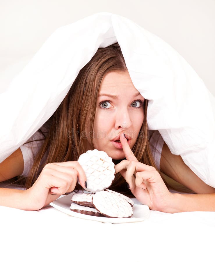 Woman eating cookies