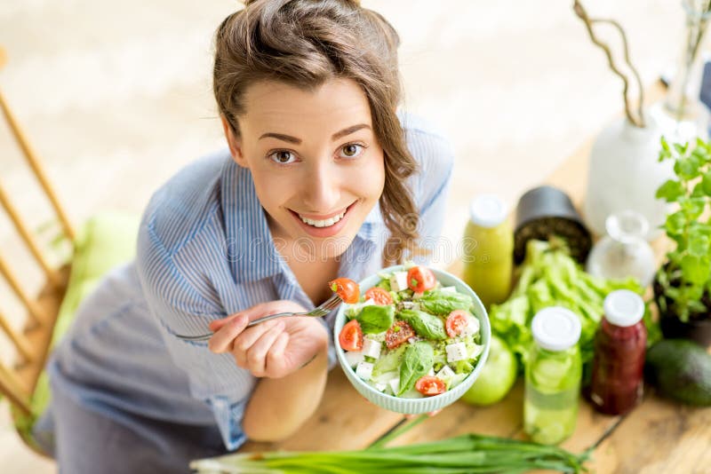 Woman eating healthy salad