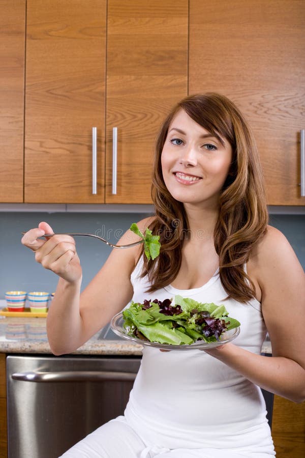 Woman eating a salad