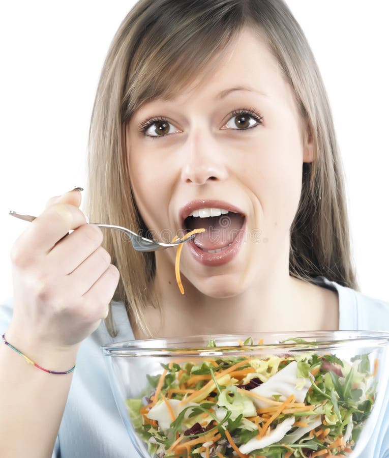 Woman eating salad