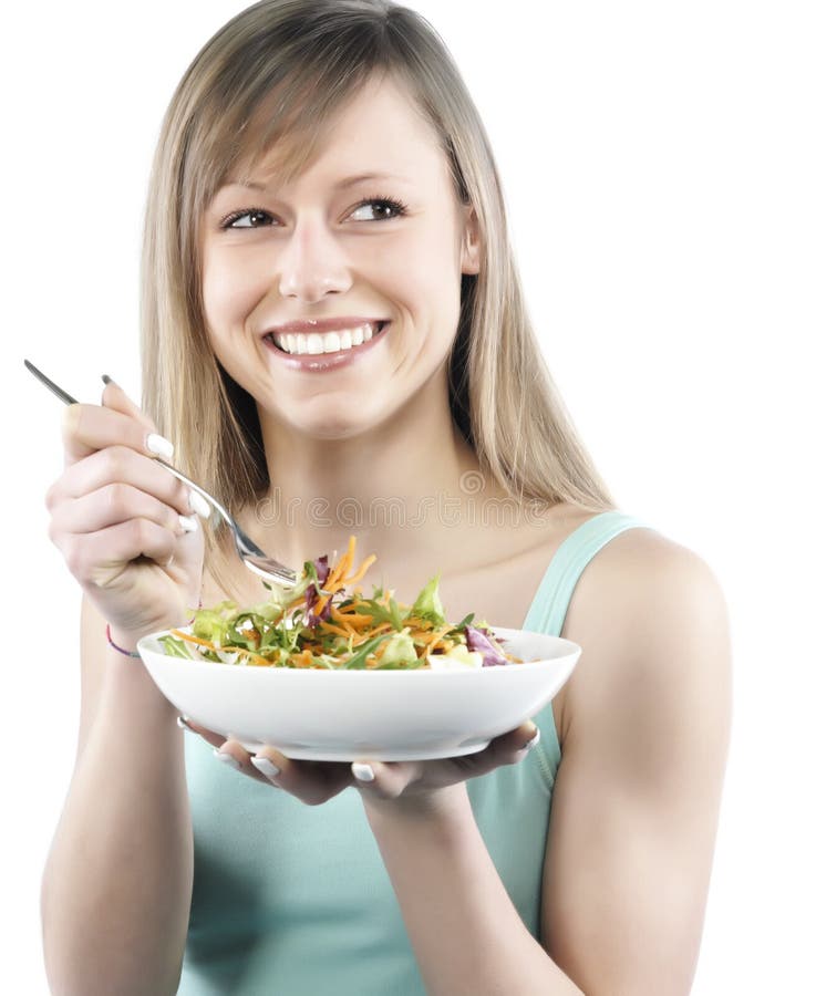 Woman eating salad