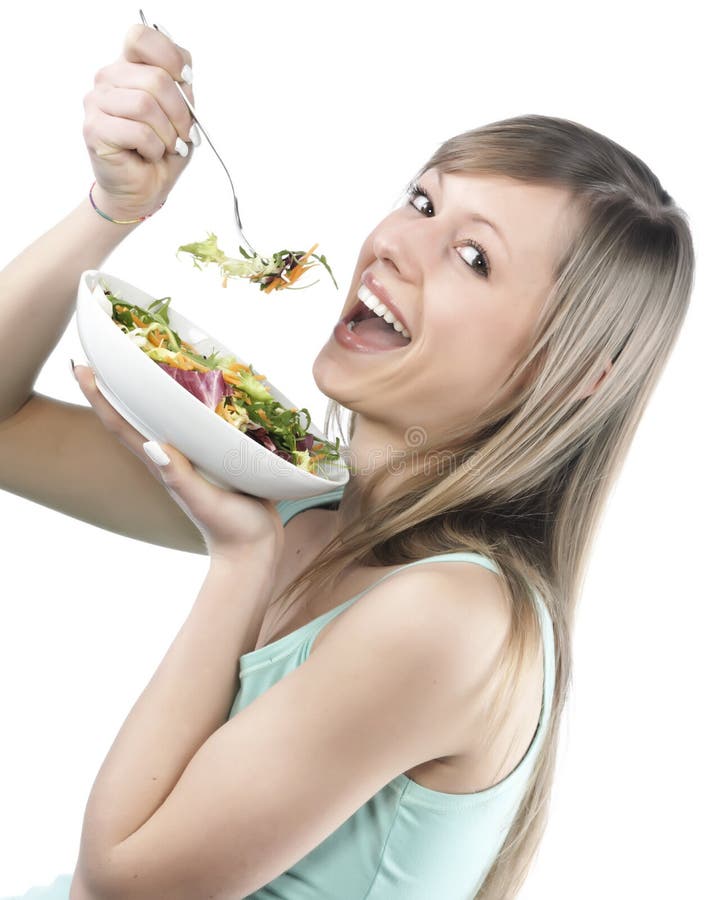 Woman eating salad