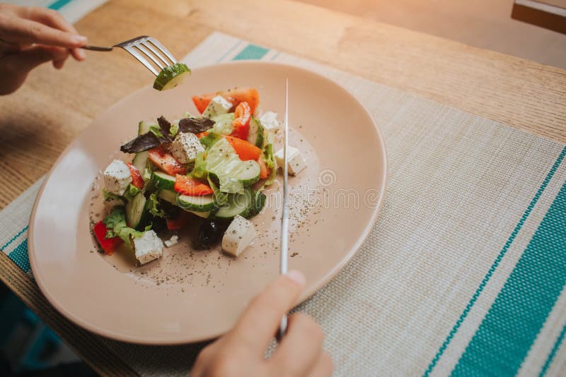 Woman, eating salad. Close up, top view stock images Woman, eating salad. Close up, top view stock images