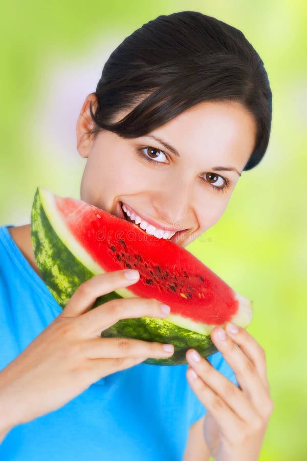 Woman eating watermelon