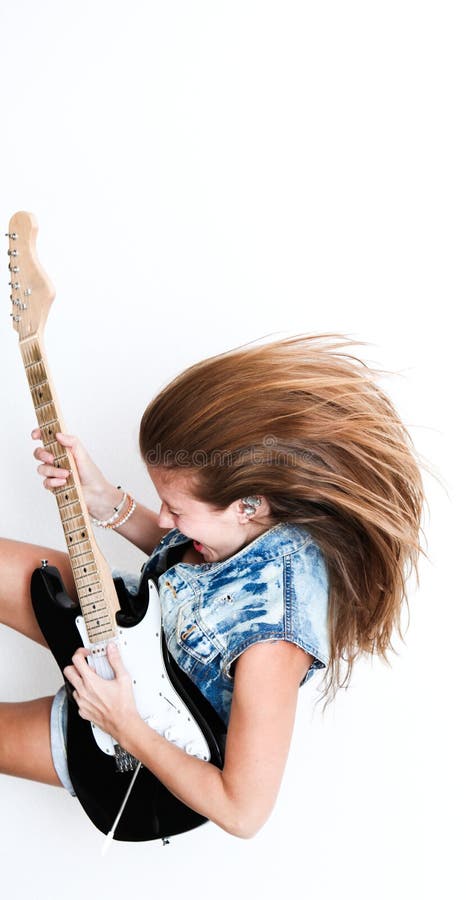 Woman with electric guitar