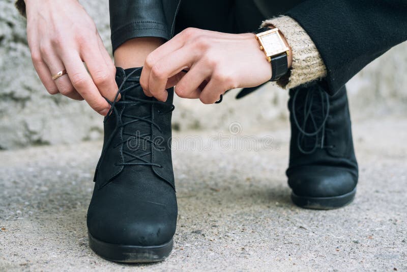 Woman In Elegant Clothes Tying Shoelaces On Shoes Close Up Stock Image ...