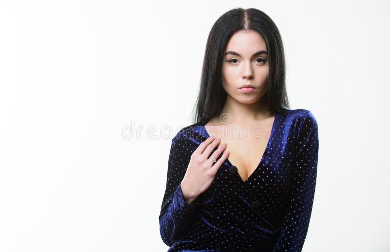 Woman elegant lady with makeup long hair wear velvet dark dress with decolette. decollete fashion dress. Girl stock image Woman elegant lady with makeup long hair wear velvet dark dress with decolette. decollete fashion dress. Girl stock image