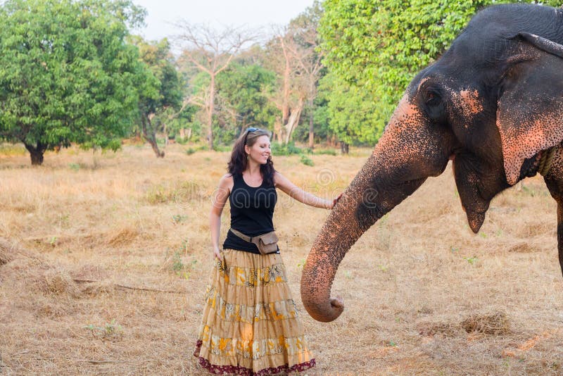 Woman with elephant stock photo. Image of tropical, india 80157258