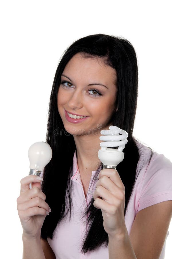 Woman with energy-saving lamp. Energy lamp royalty free stock photography