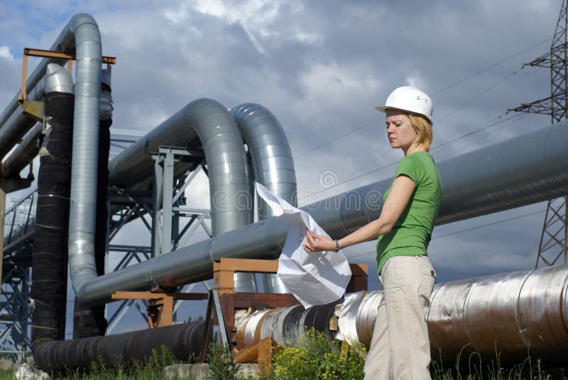 Woman engineer or architect with white safety hat