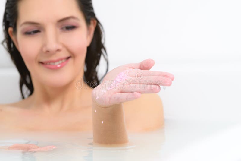 Woman enjoying a therapeutic aromatherapy bath