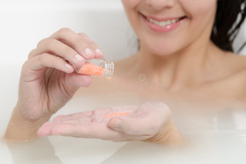 Woman enjoying a therapeutic aromatherapy bath