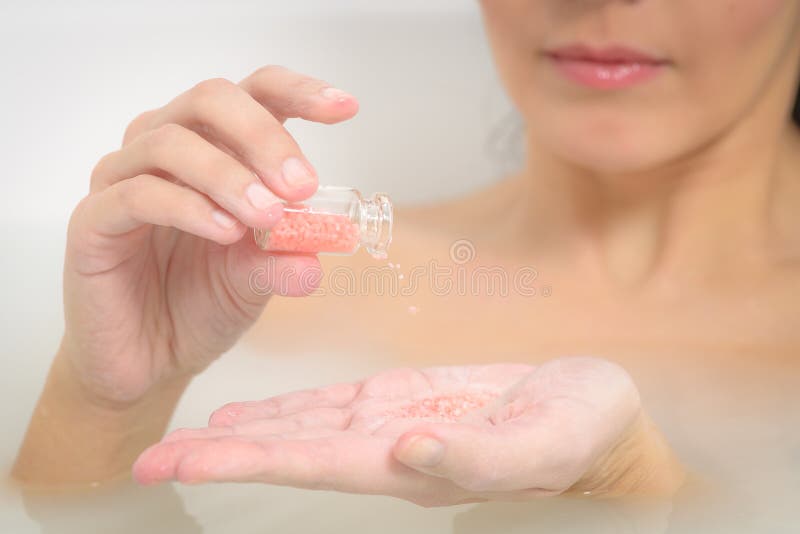 Woman enjoying a therapeutic aromatherapy bath