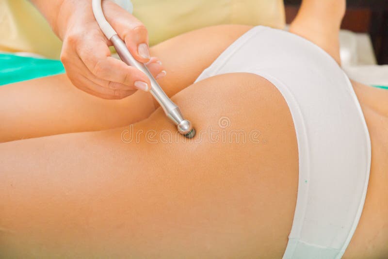 Woman enjoying the treatment in a Spa center