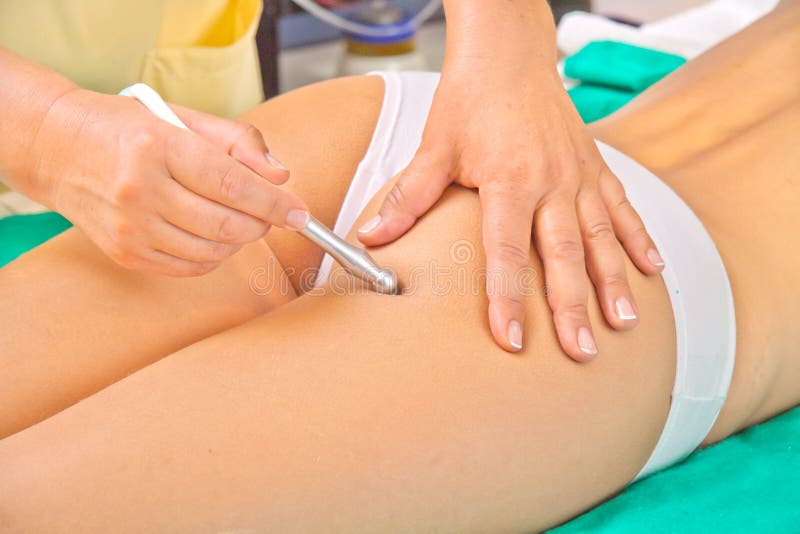 Woman enjoying the treatment in a Spa center