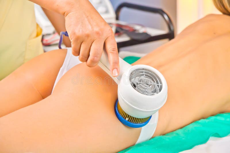 Woman enjoying the treatment in a Spa center