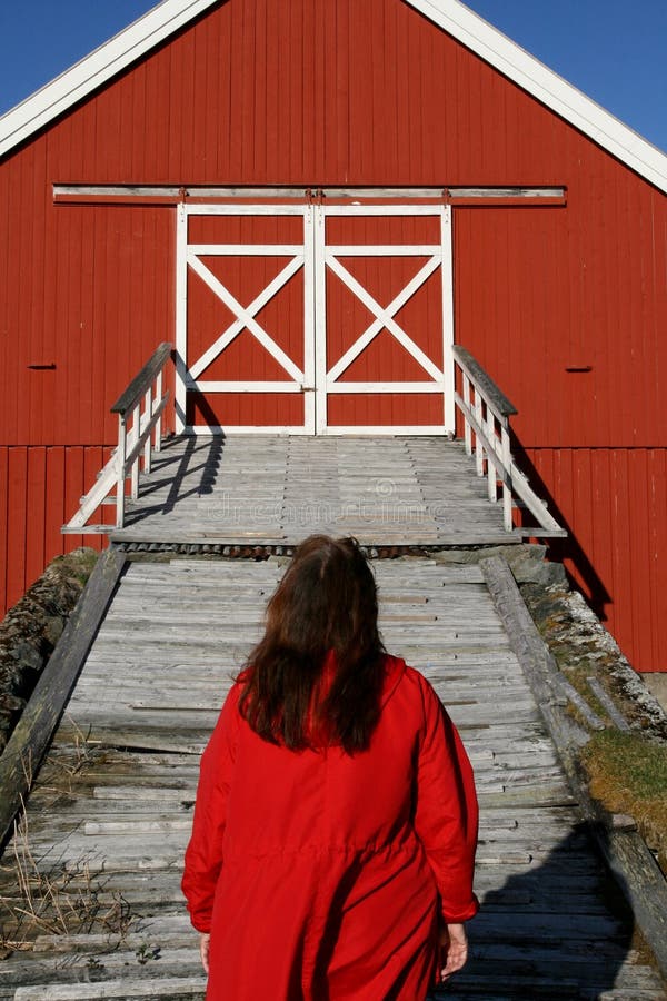 Woman entering a barn bridge