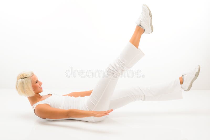 Woman exercise abdomen muscle white fitness stock photo Woman exercise abdomen muscle white fitness stock photo