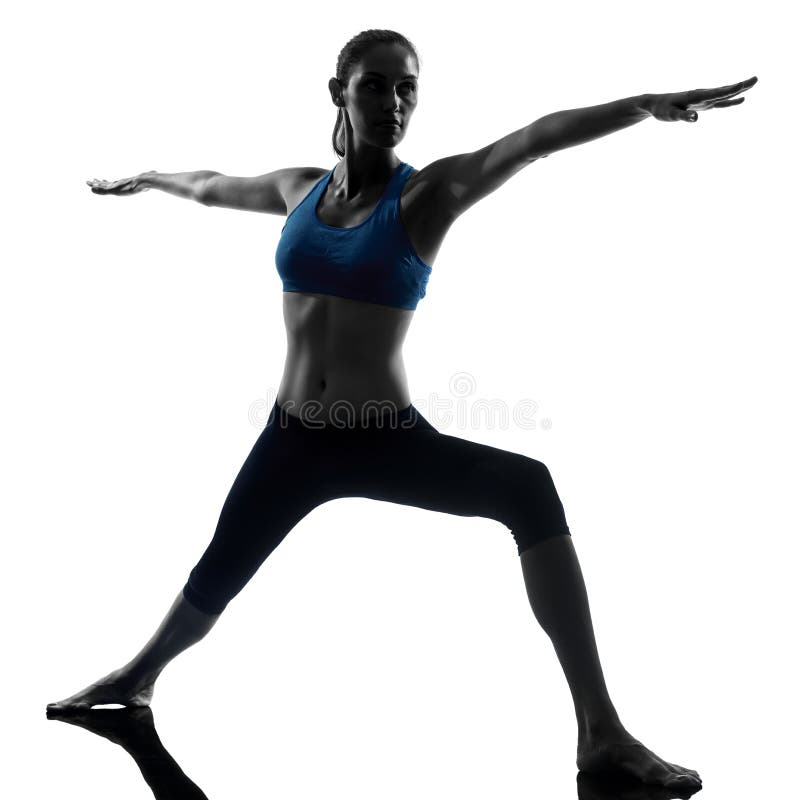 Woman exercising yoga warrior position 2