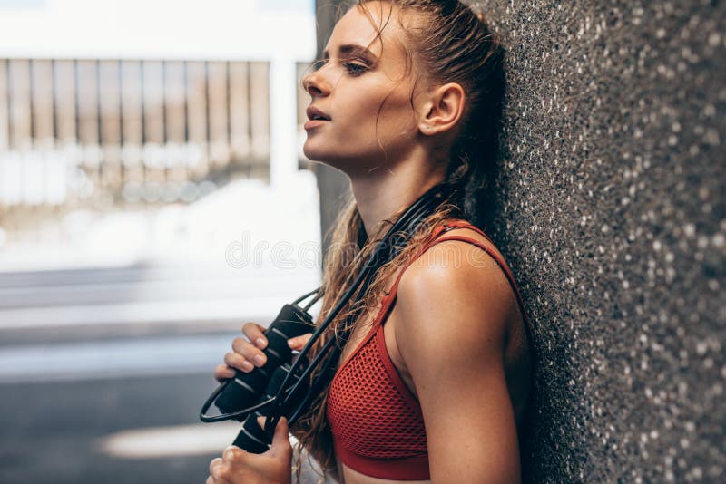 Woman exhausted after intense workout session royalty free stock photos Woman exhausted after intense workout session royalty free stock photos