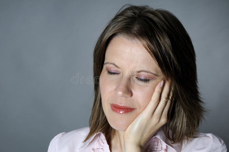 Woman expressing dental pain