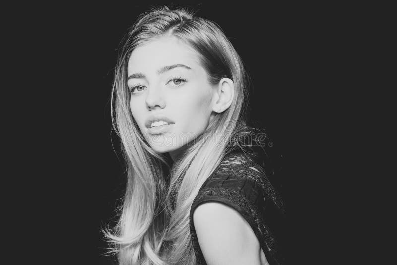 Woman face beauty. Fashion model pose isolated on black background. royalty free stock images Woman face beauty. Fashion model pose isolated on black background. royalty free stock images