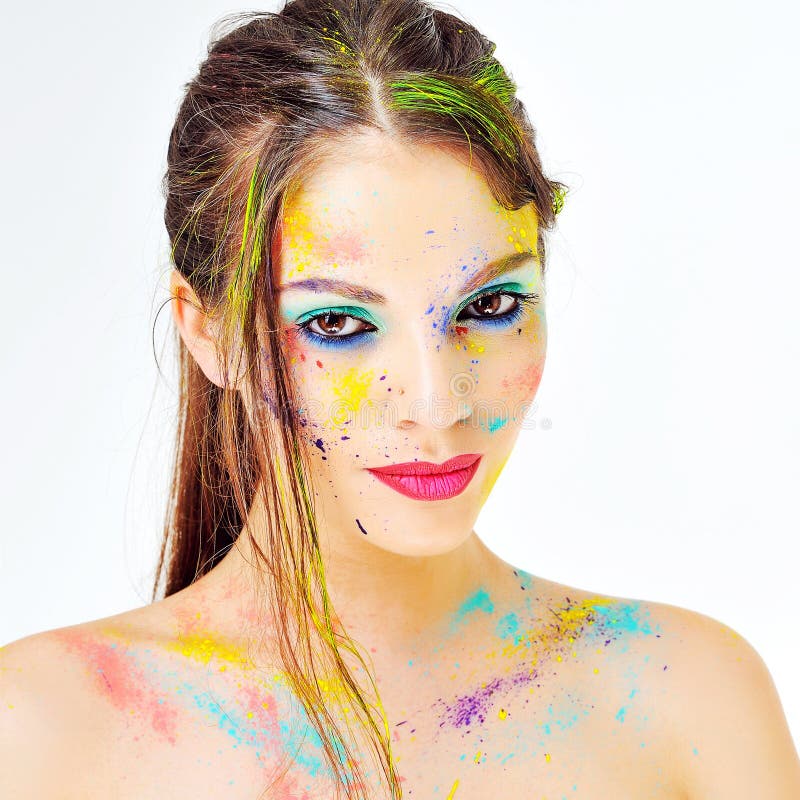 Portrait Of Beautiful Young Woman With Paint On Face Stock Image