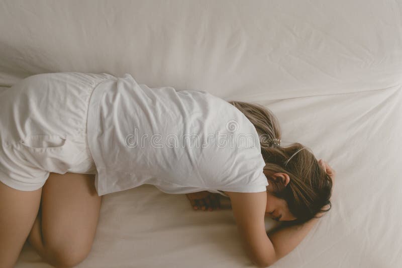 Woman Fall Asleep on the Sofa As she Tired and Sick. Stock Image