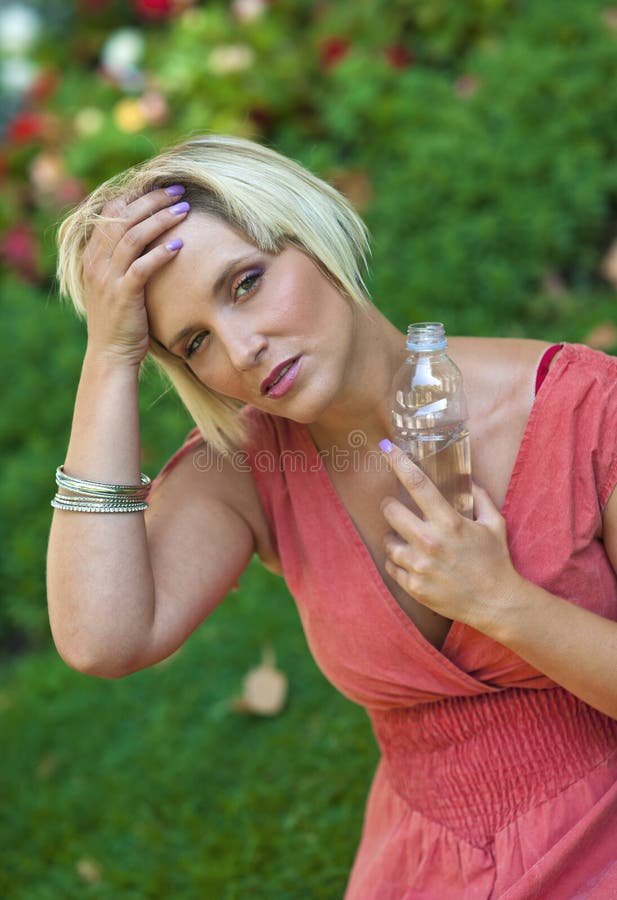 Woman feeling hot stock photo. Image of drink, healthy 26557282