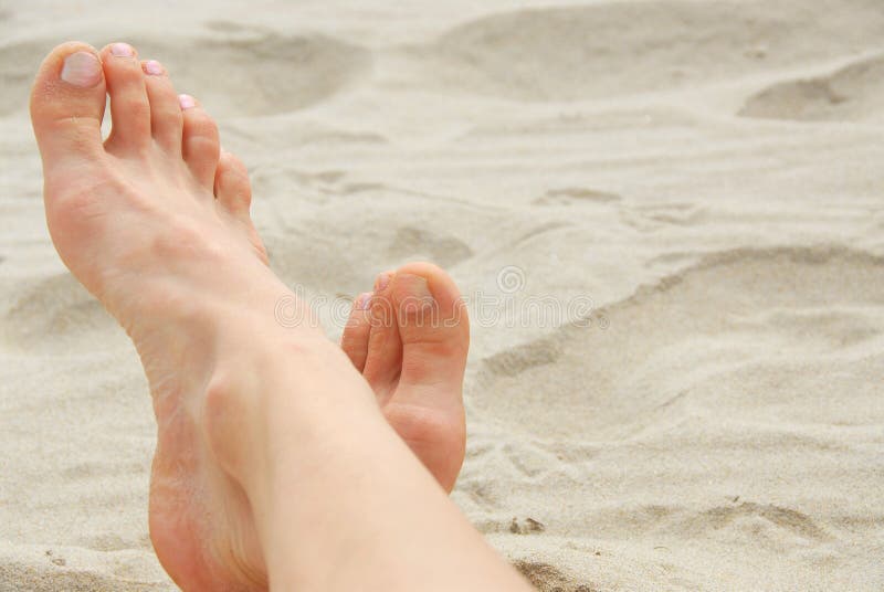 Woman feet beach royalty free stock photo