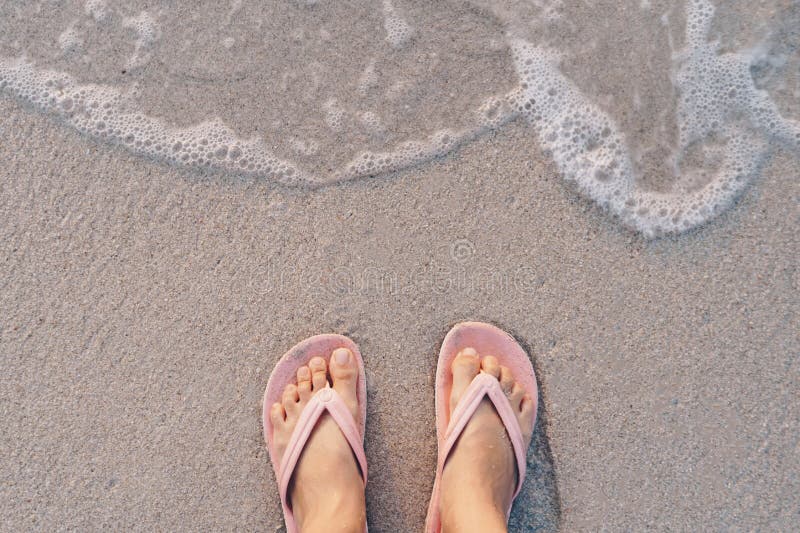 Woman Feet Wear Slippers Stand on Sand Tropical Beach with Sea Water ...