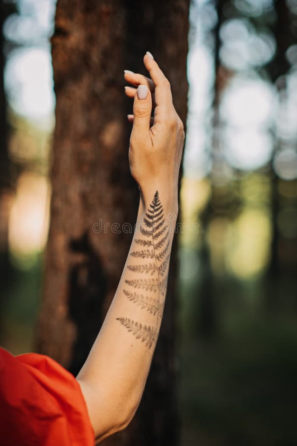 Forest circle tattoo on the inner wrist