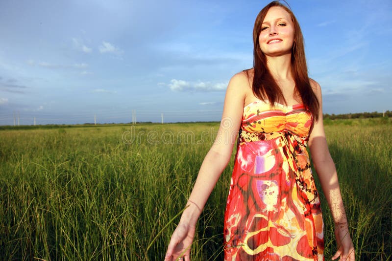 Woman in field stock photo