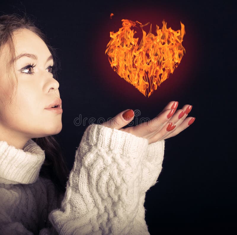 A woman and a fiery heart.