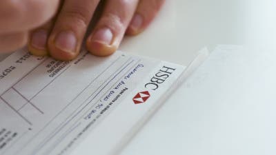 Woman Filling a Banque Cheque Document with HSBC Logotype Stock Video -  Video of hsbc, invest: 155240641