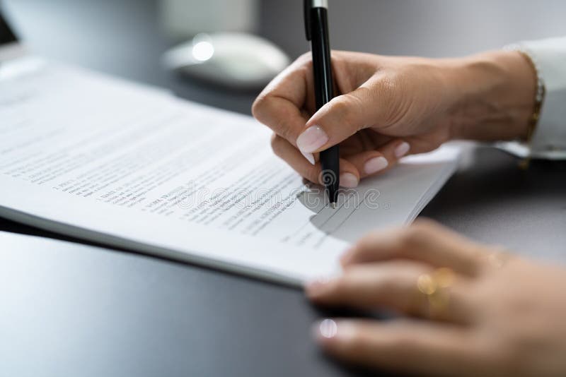 Woman Filling Business Contract