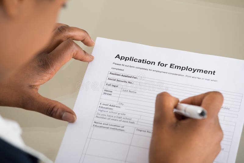 Woman Filling Employment Form stock photo
