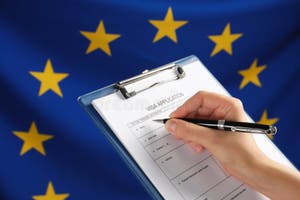 Woman Filling Visa Application Form Against Flag Of European Union Closeup Stock Photo Image Woman Filling Visa Application Form Against Flag Of European Union Closeup Stock Photo Image