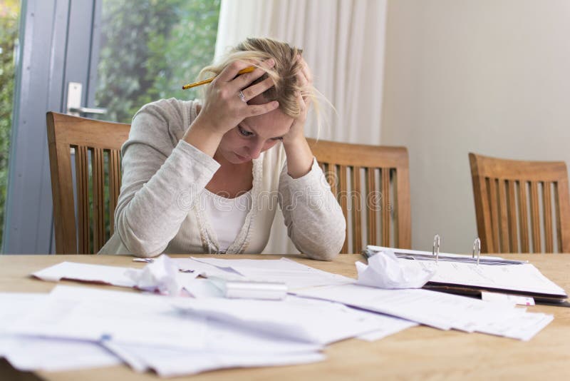 Woman in financial stress royalty free stock photo