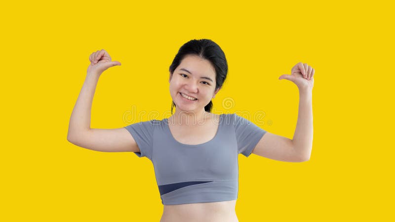 Woman showing off biceps abs hi-res stock photography and images - Alamy